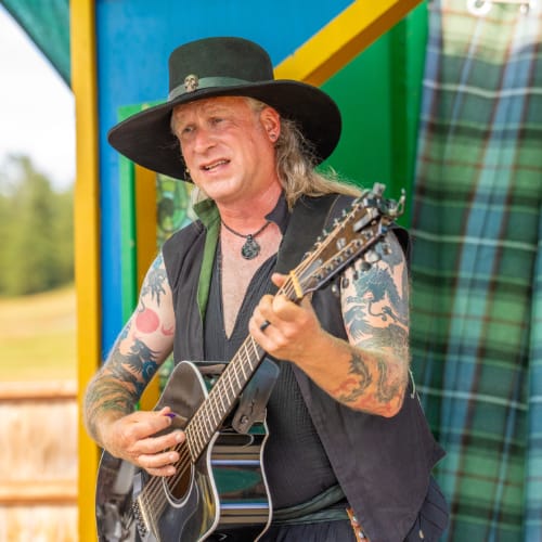 Untitled design (4) Jeremy Graeff playing guitar